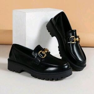 Black Lug-Sole Loafers with Gold Bit Hardware